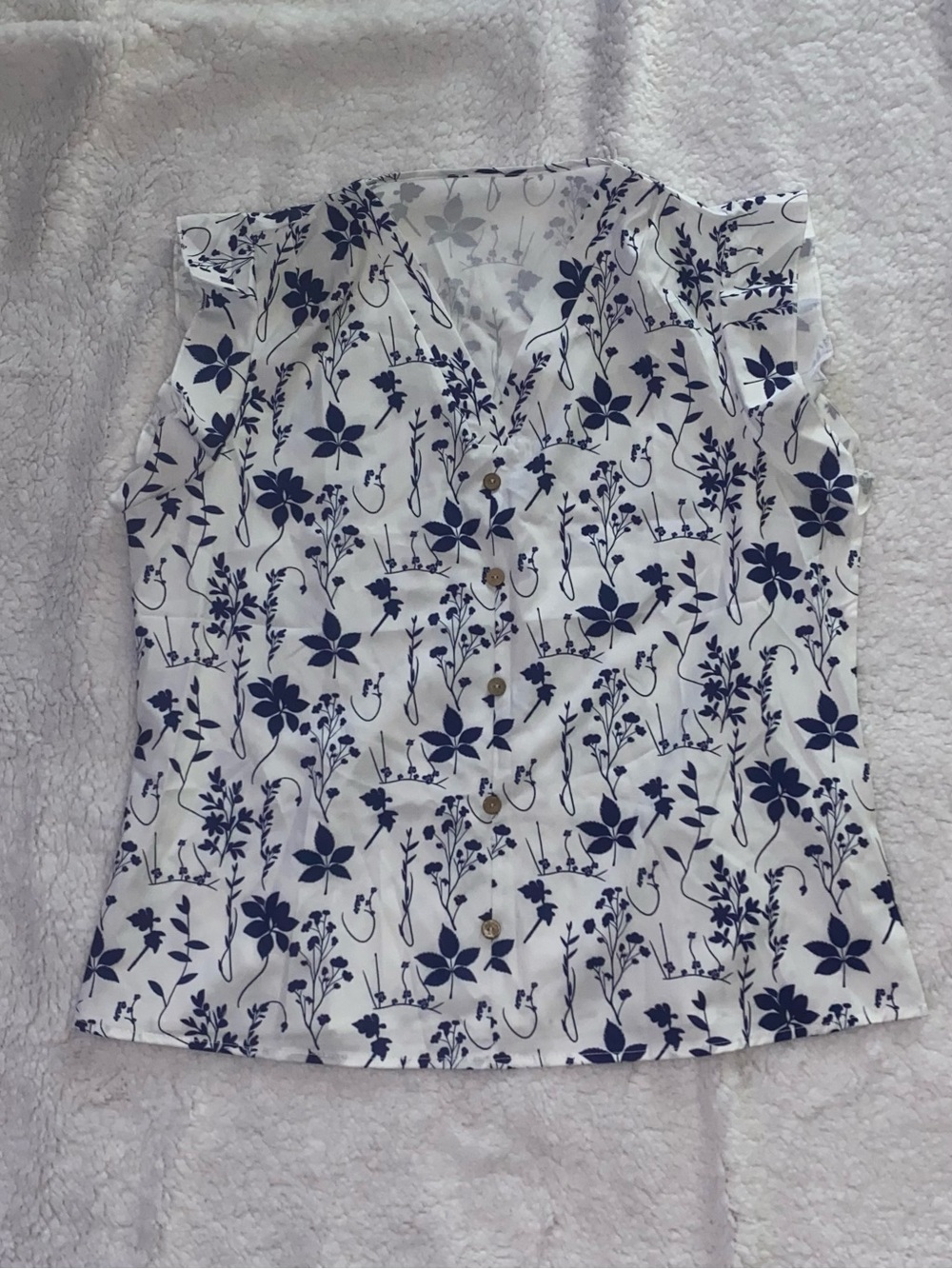 SHEIN White Sleeveless Button-Front Floral Top with Navy Print